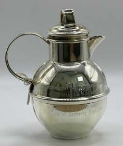 A silver-plated milk Guernsey (or possibly Jersey) milk can