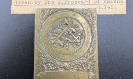 A small Brass Plaque donated to the Museum in June 1935 by Bro Guy Frossard.