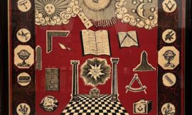 A silk handkerchief measuring about 1mtr square it was identified in 1912 as a Snuff handkerchief English mid-19th century